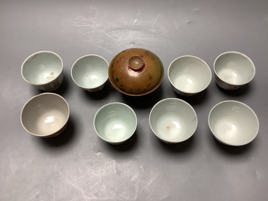 A 19th century Chinese painted soapstone rice bowl and cover and a group of red enamelled porcelain cups